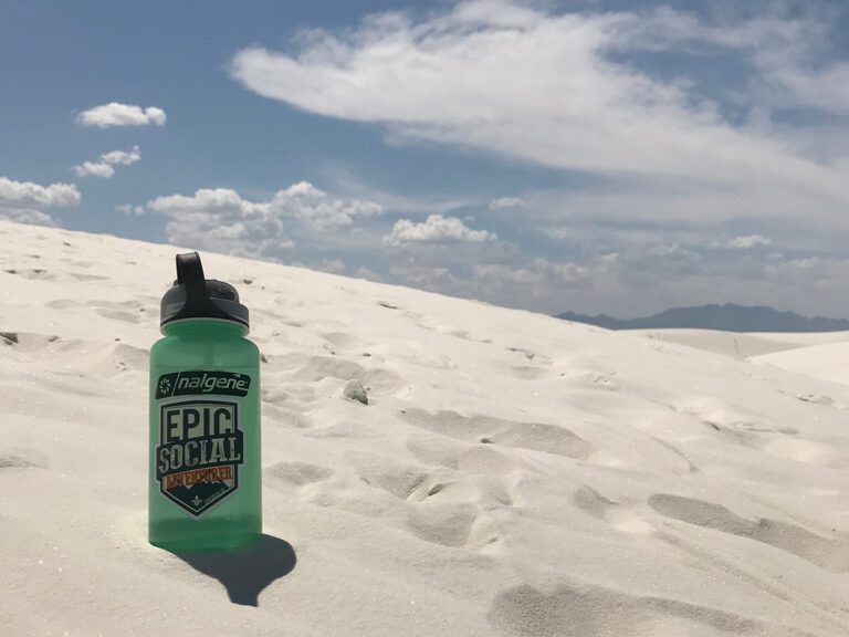 Spotting and Treating Symptoms of Mild Dehydration Water Bottle in Sand Dune